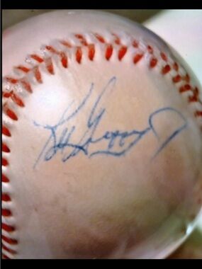 Autographed Baseball with Red Stitching and Blue Ink Signature Ken Griffey jr
